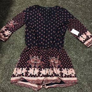 Beautiful blue, pink and white romper NWT sz S